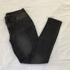 Black skinny jeans with skeleton hands on butt